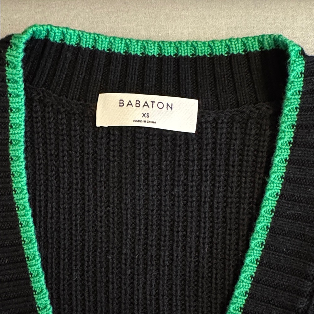 Babaton Sherman Black Knit V-Neck Sleeveless Relaxed Fit Sweater with Green Trim - Picture 15 of 16